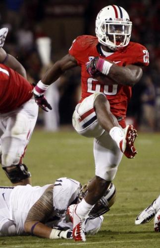 ARIZONA 52 WASHINGTON 17: Cats back on track    
