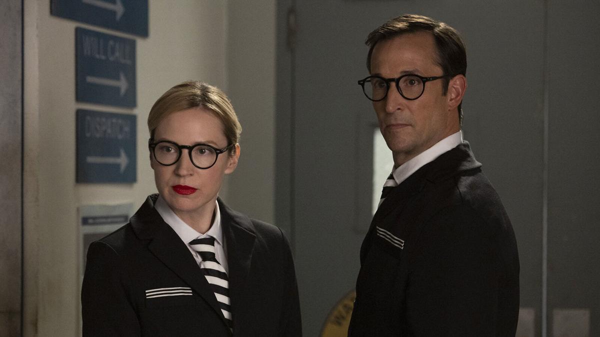 Beth Riesgraf, left, and Noah Wyle in the second season of“ Leverage: Redemption.”.