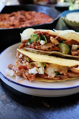 Chicken tinga tacos are easy to make and depending on the toppings offered, totally customizable.