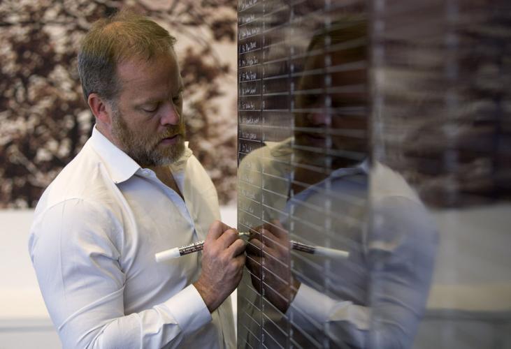Afghanistan Veteran writes names of dead soldiers by memory