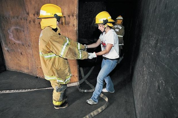 Girls learn firefighting skills at fire camp  