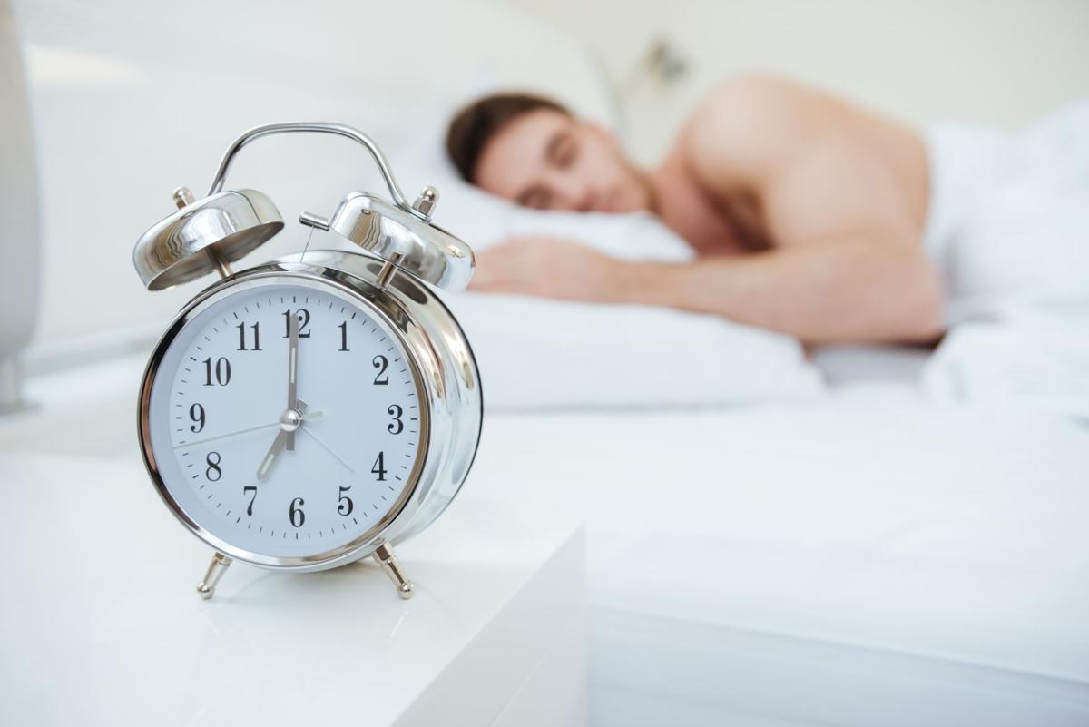 Man sleeping on bed