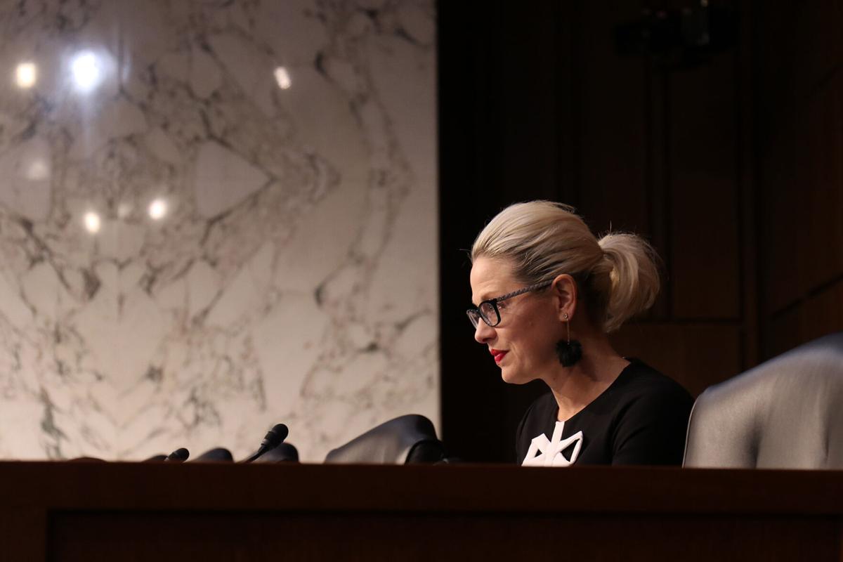 Sinema defends filibuster on same day it’s used to stall voting rights