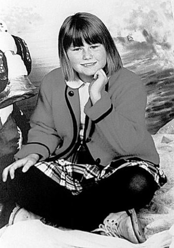 Parents sure woman is girl abducted in '98  