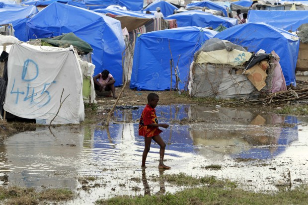 With big rains coming, Haiti delays refugee-camp plan   
