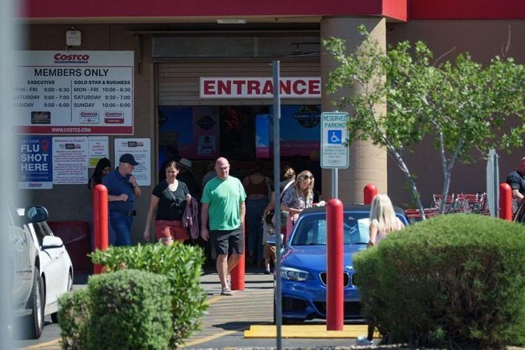 People enter and exit the Costco location on North Hayden Road, photographed on April 7, 2026, in Scottsdale, Ariz.