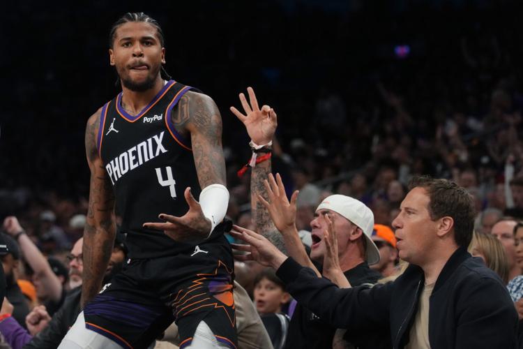 Phoenix Suns guard guard Jalen Green (4) celebrates his 3-pointer against the Oklahoma City Thunder during Game 3 of their playoff series at Mortgage Matchup Center in Phoenix on April 25, 2026.