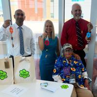 Three belled for helping woman hurt when struck by vehicle