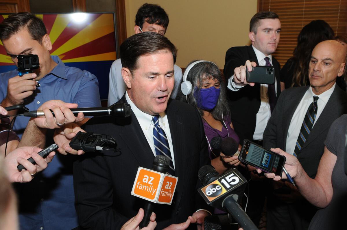 Gov. Doug Ducey, masks, school districts