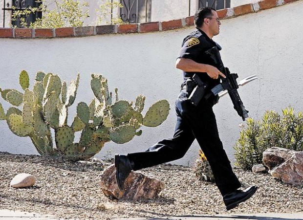 TPD cop shot, 2nd stabbed on city's N. Side