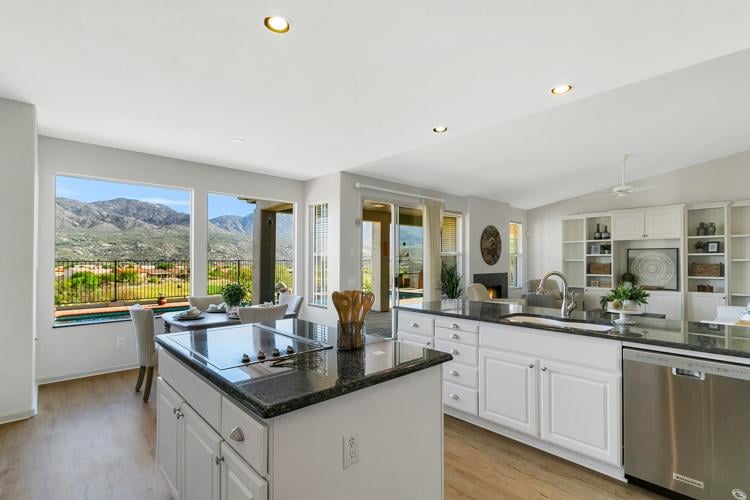 With-wall-painted-a-neutral-shade-the-kitchen-s-Blue-Pearl-granite-tops-get-the-star-billing-they-deserve.jpg