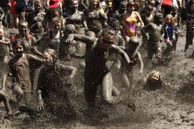 Photos: Mud Day looks fun for mudders, not mothers doing laundry ...