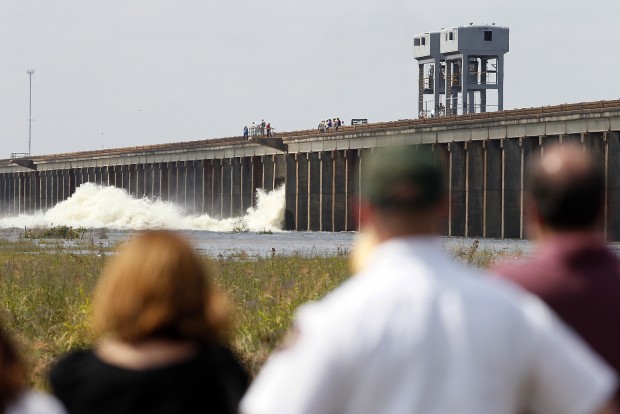 Mississippi River gushes through opened floodgate   