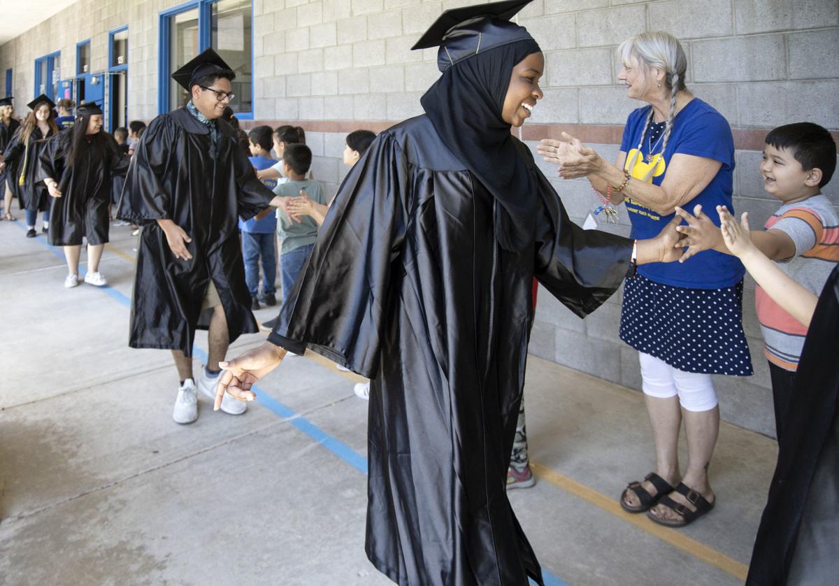 Amphi grads visit elementary schools