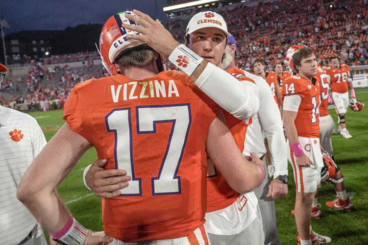 Clemson quarterback Cade Klubnik (2) consoles quarterback Christopher Vizzina (17) after the game at Memorial Stadium in Clemson, S.C. Saturday, October 18, 2025. SMU won 35-24.