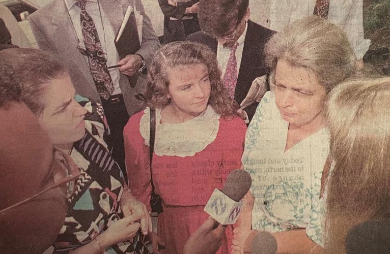 Sabrina and Janice talk to reporters