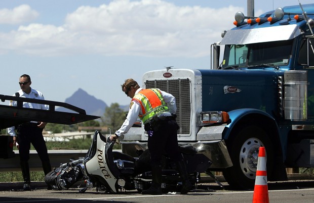 Cycle, semi collide on I-10   