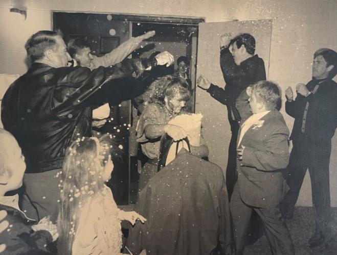 Sabrina and Elwood get rice thrown at them