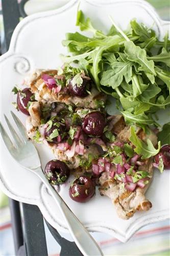 Pork with a fresh take on salsa _ grilled cherries