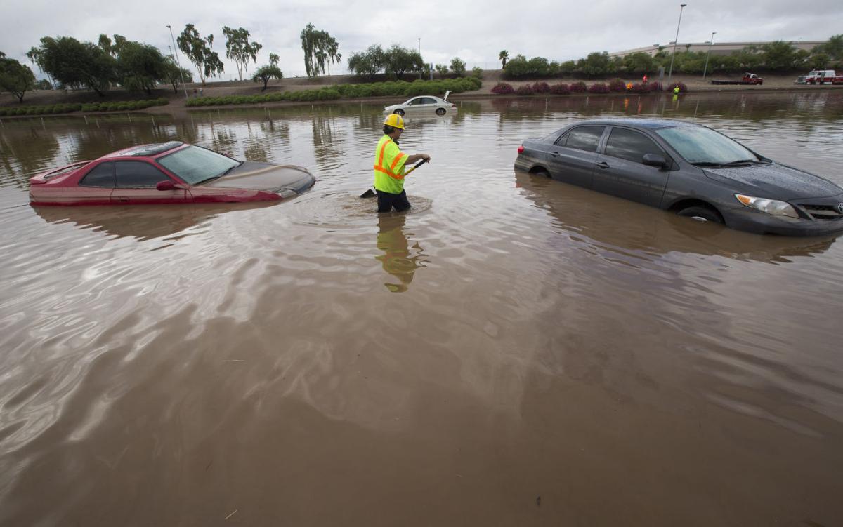 Photos Arizona rainfall floods Phoenix and breaks record