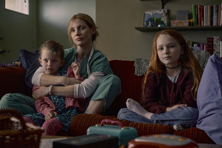 From left, Devyn McDowell as Maya Loughren, Jessica Chastain as Amy Loughren and Alix West Lefler as Alex Loughren in "The Good Nurse" on Netflix.
