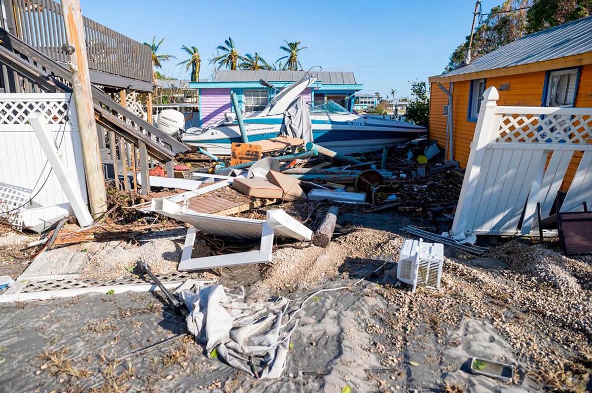 A damaged property is seen near a broken section of Pine Island Road on Sept. 29, 2022, in Matlacha, Florida.