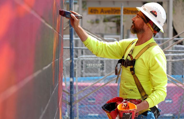 New mural takes flight at Tucson apartment complex