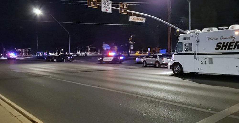 Gunman, Tucson police dog shot, wounded in confrontation