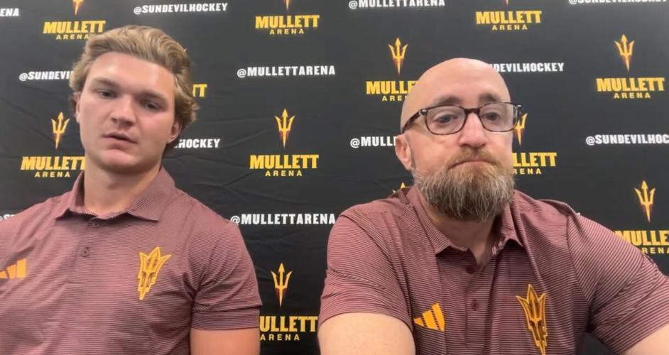 Arizona State hockey coach Greg Powers, right, and junior forward Ben Muthersbaugh take part in an NCHC media day session Sept. 23, 2026.