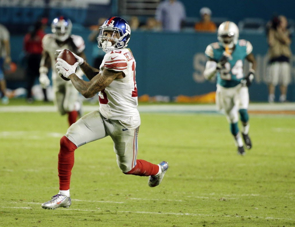 Beckham scores 2 TDs to help Giants beat Dolphins 31-24