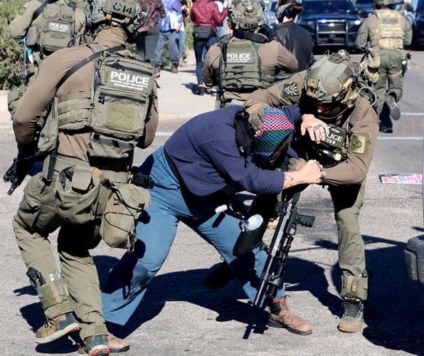 Protesters clash with federal agents