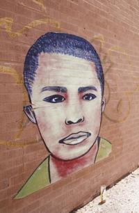 Neto's Tucson: 2 faces on west-side wall are quiet, tragic reminder