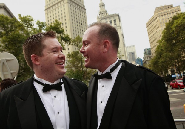 Gay marriage law takes effect; protests held in several cities   