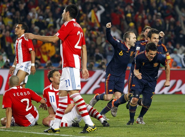Villa goes post to post as Spain holds off Paraguay   