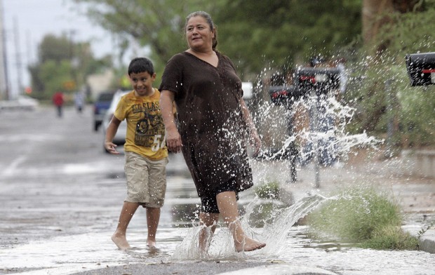One foot of water can sweep away cars, authorities warn