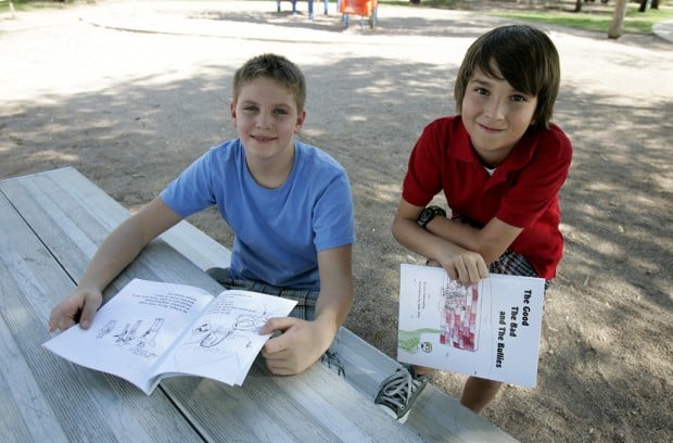 Two boys join in creating book about experiences with bullies    