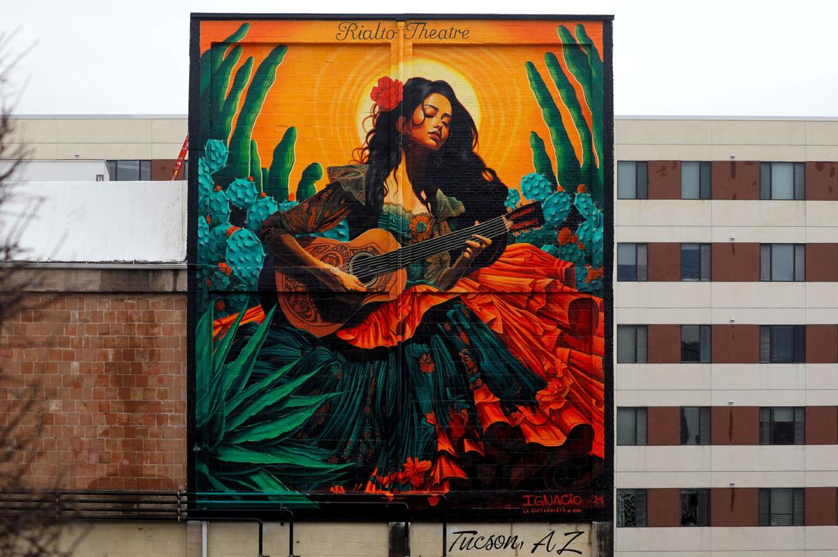 Tucson mural: Giant guitar player replaces jackalope-riding Bill Walton downtown