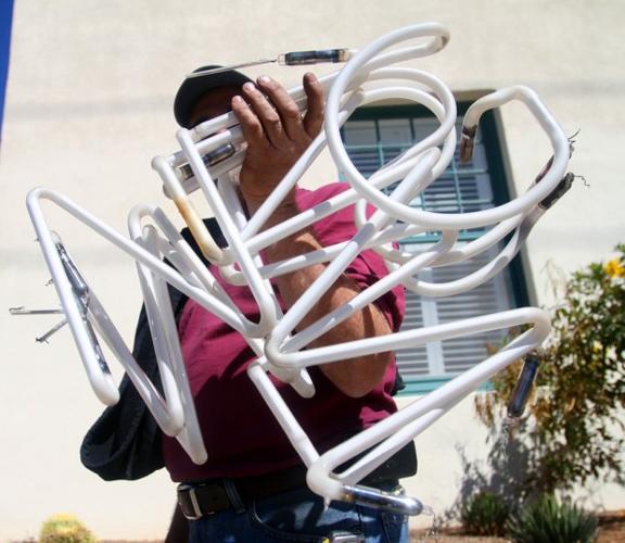 Old sign comes down for fix-up    