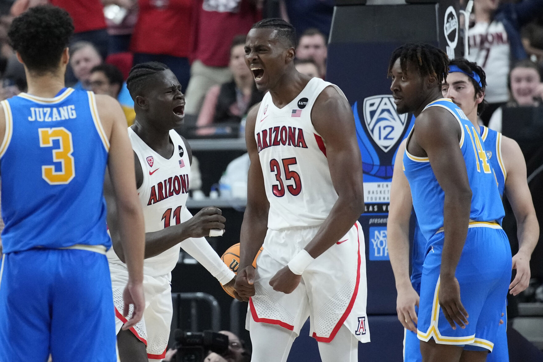 Comparing Tommy Lloyd's Pac-12 and Big 12 champions