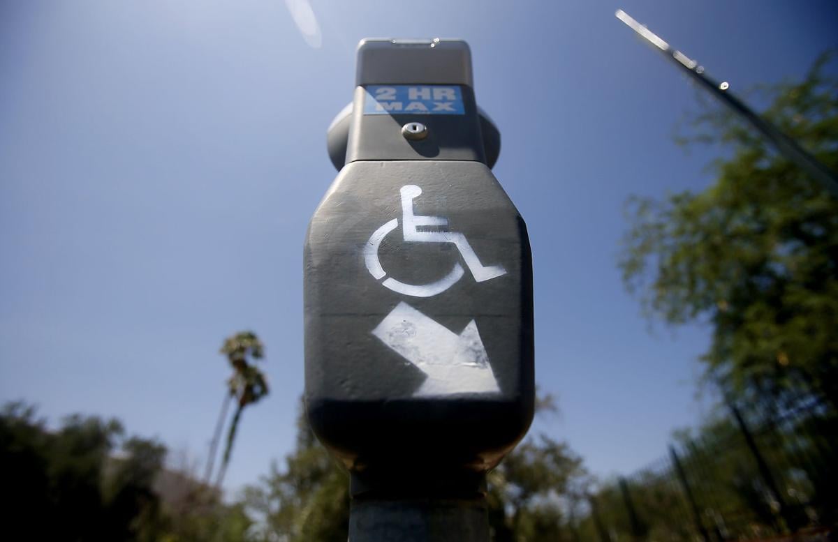New Tucson parking meters too tall, complaint says ...