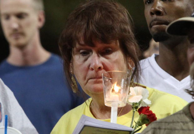 Vigil honors slain store clerk