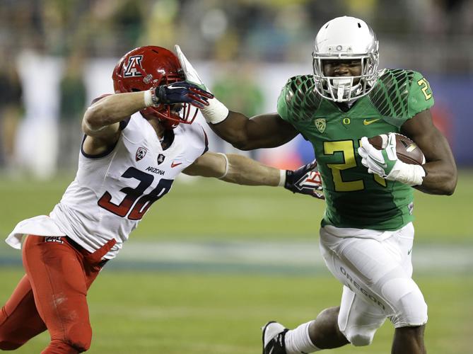 Royce Freeman, Jared Tevis