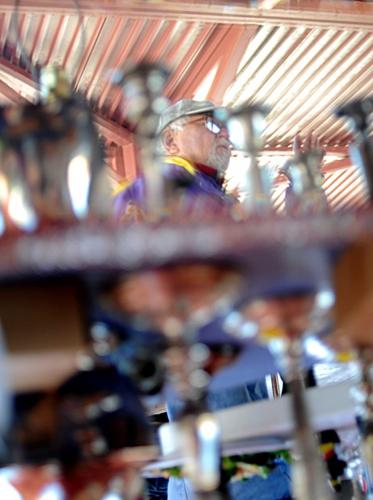 Monthly antique fair chugs on no matter holiday or weather   