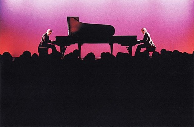 Four thumbs up for twin pianists  