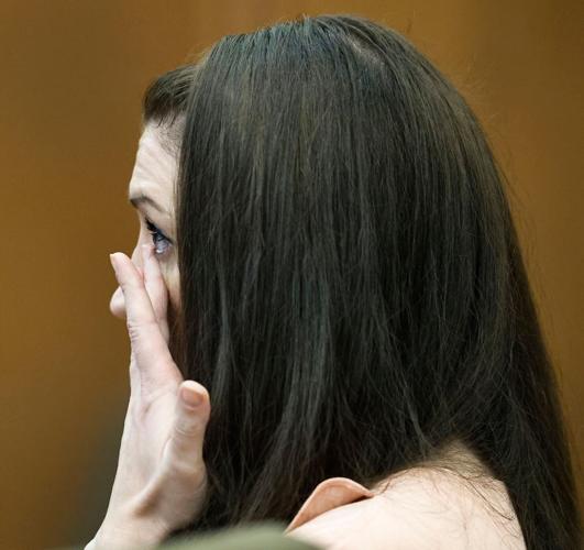 Defendant Lindsay Clancy wipes away tears as she listens to testimony. The Lindsay Clancy murder trial in Plymouth Superior