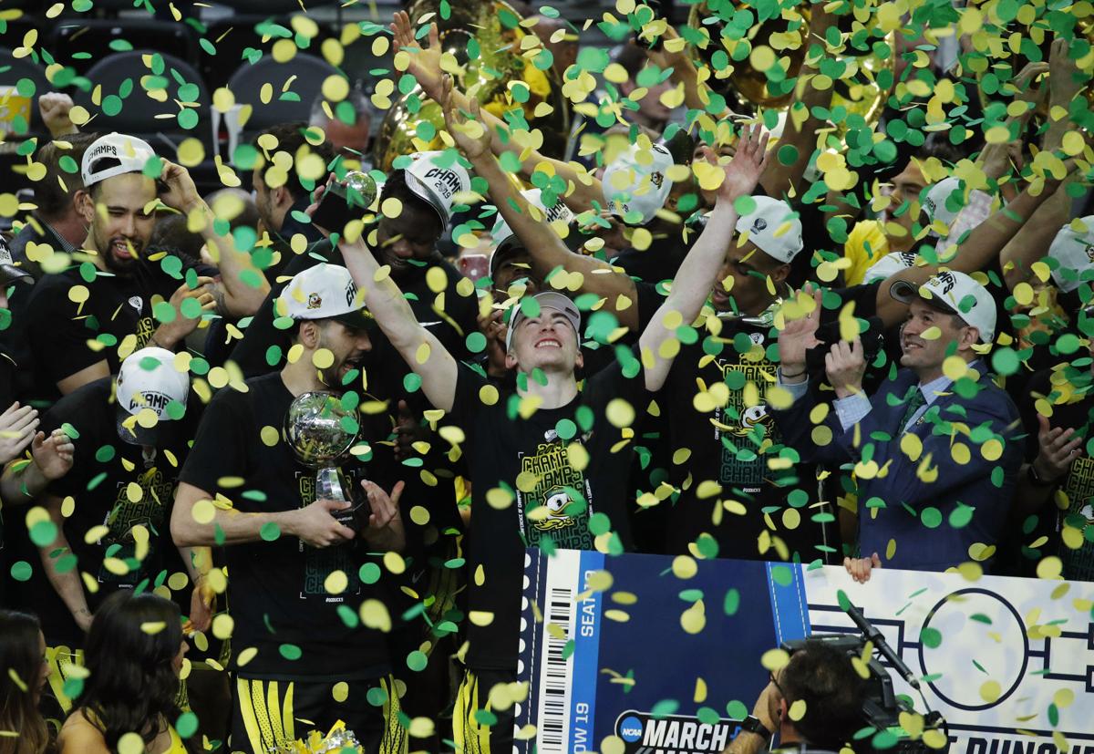 APTOPIX P12 Oregon Washington Basketball