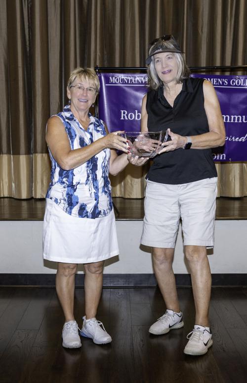 Lori-Stegink-presents-2026-Club-Champion-trophy-to-Karyn-Engel.jpg