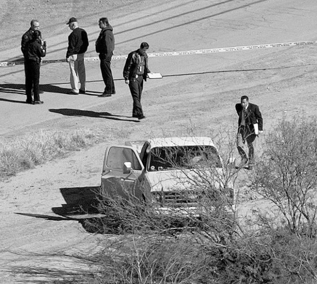 Officer kills man struggling to get his gun  