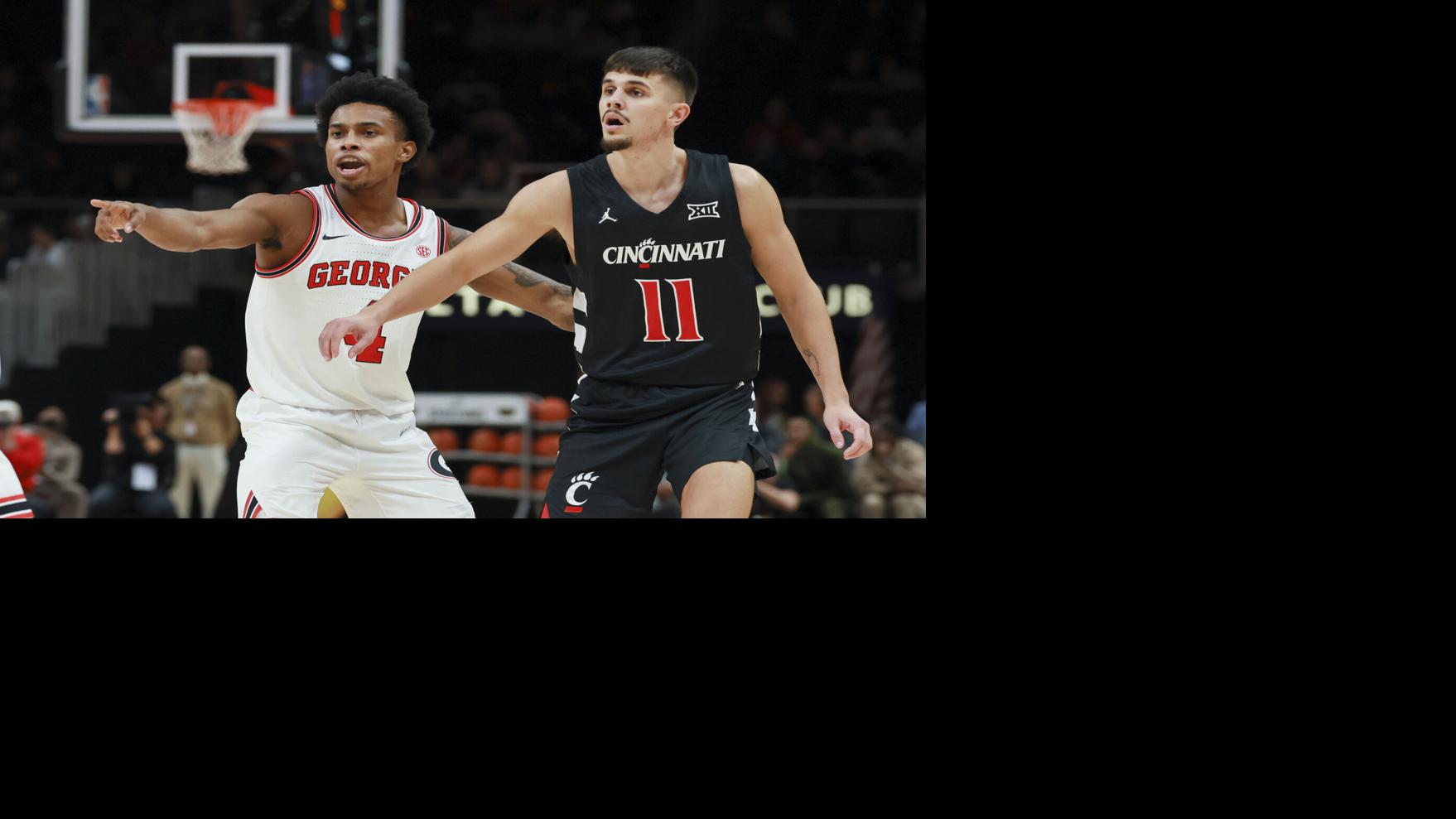 Ex-Arizona basketball player arrested by FBI in fraud scam, according to report