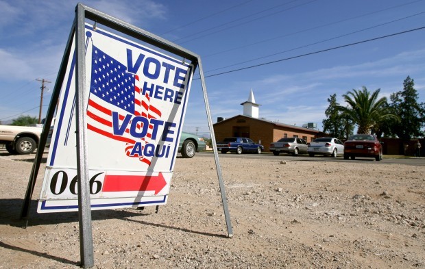 Vote here sign